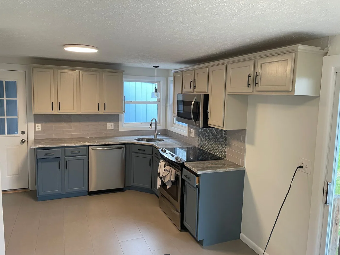 Kitchen cabinet refinishing — after